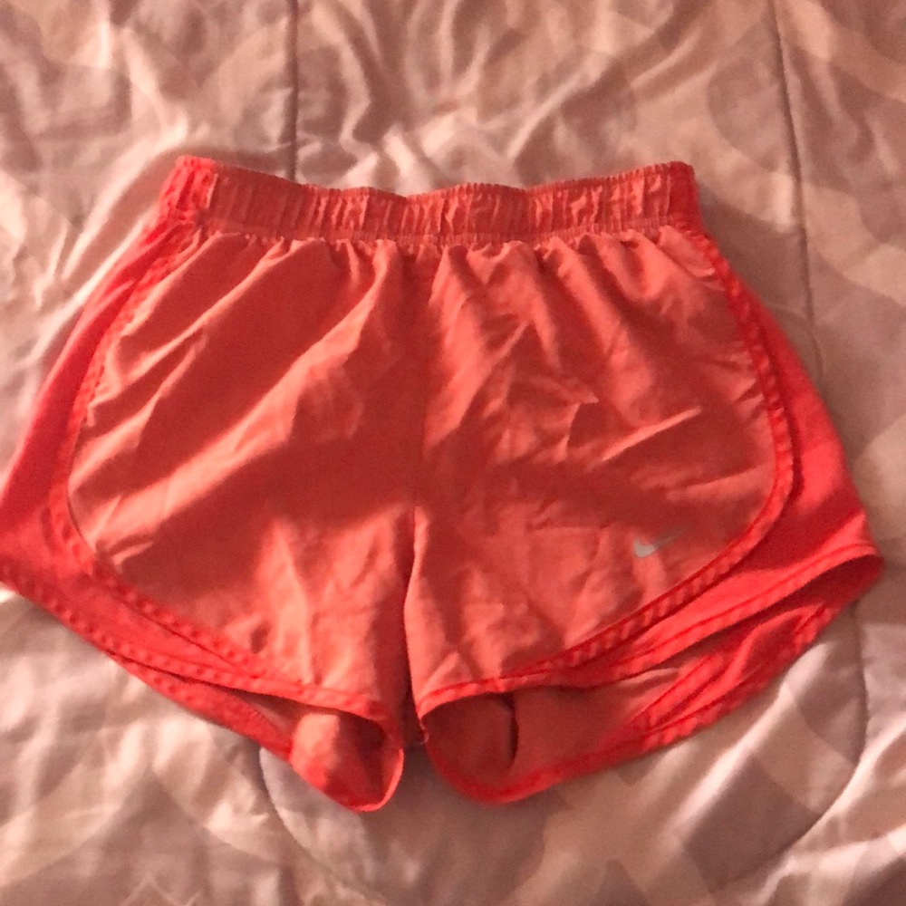 Orange Nike running shorts size women’s XS with drawstring